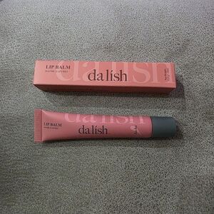 Da Lish Tinted Hydrating Lip Balm in the shade Sacha. 